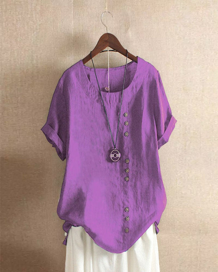 Stylish women's button-up tunic blouse, short sleeve, comfortable summer shirt.