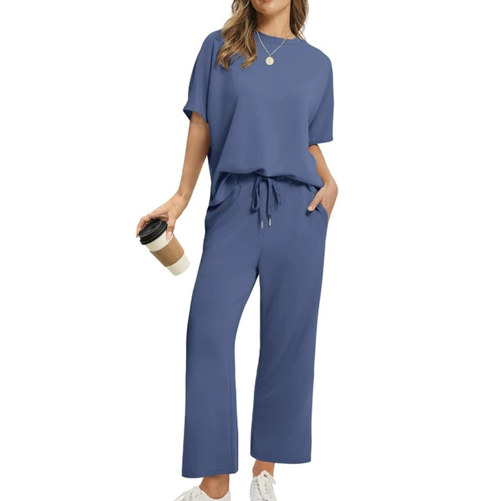 Everyday women's two-piece casual lounge set in rayon blend with pockets. Relaxed fit top & wide-leg pants.