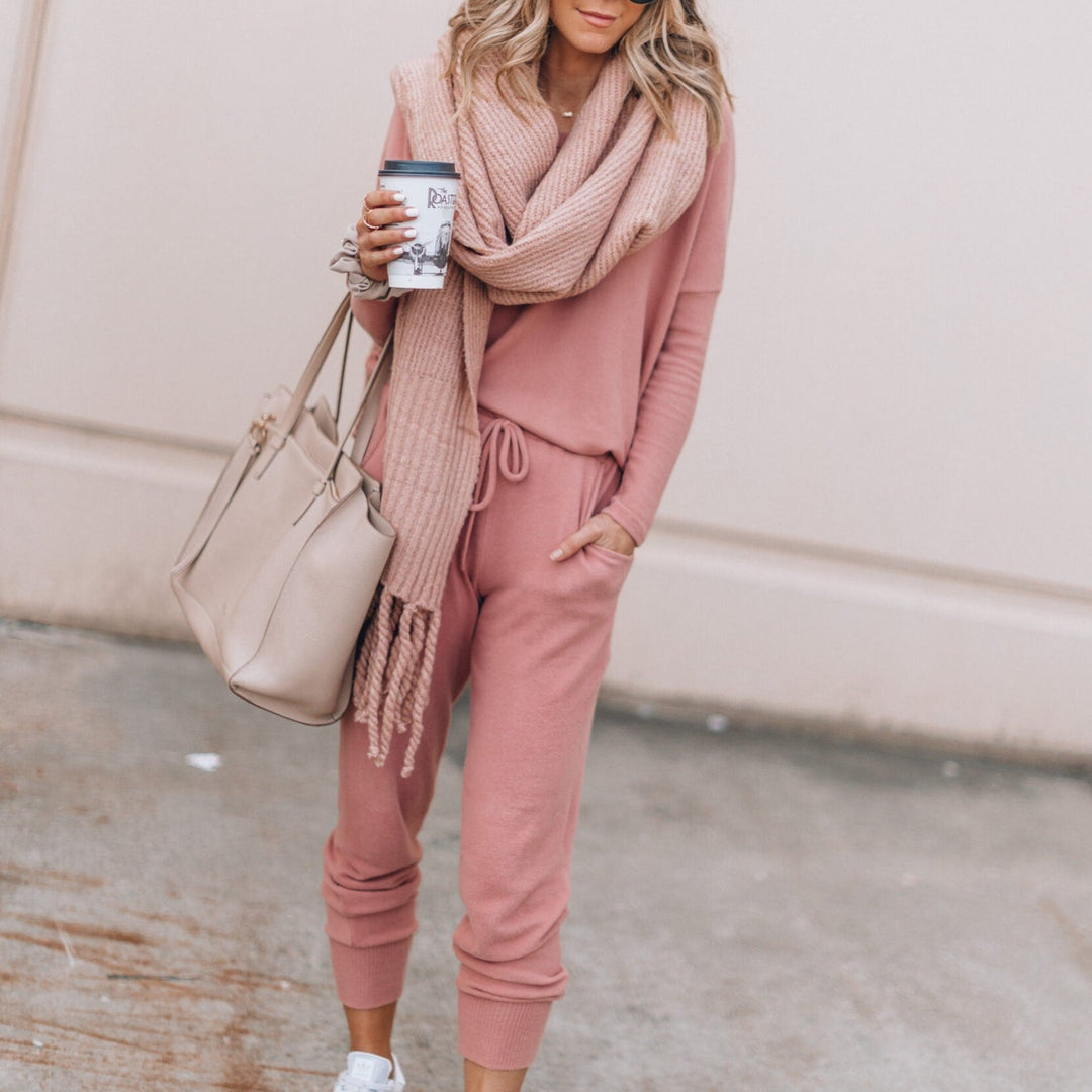 Matching loungewear set for women, featuring a long-sleeve top and joggers for athleisure style.