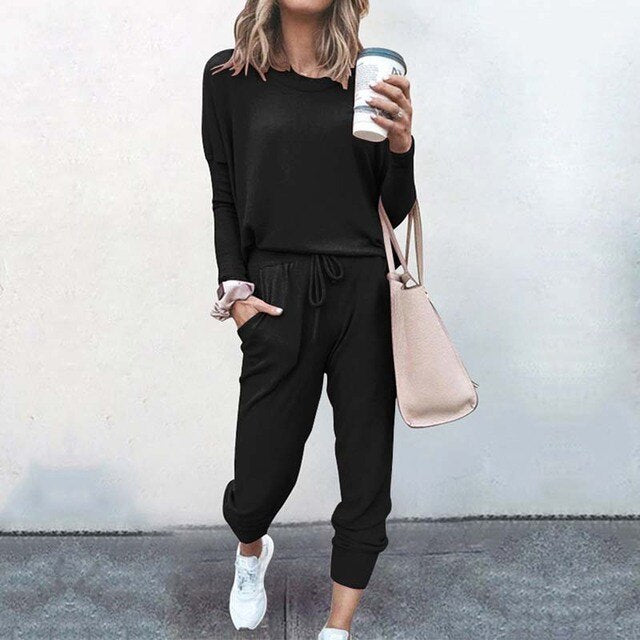 Relaxed fit women's loungewear set with joggers, emphasizing comfort and casual style.