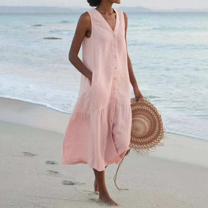 Sleeveless tiered V-neck button-front midi dress for women, ideal casual summer fashion.