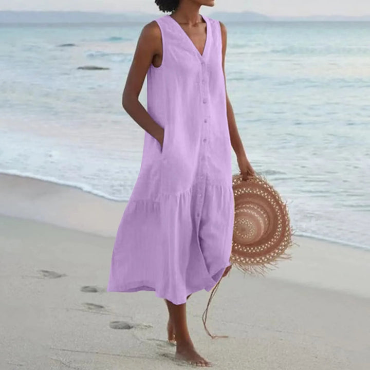 Button-front V-neck summer midi dress for women, casual, sleeveless, and perfect for vacation.