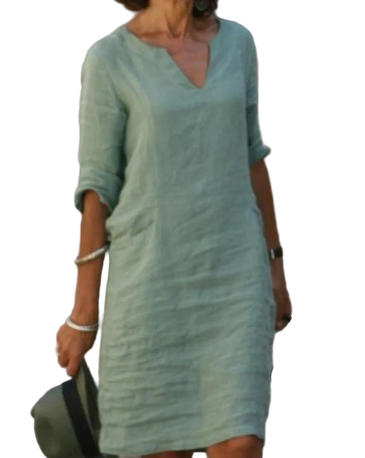 Women's casual V-neck midi dress with 3/4 sleeves, ideal for summer style & comfortable everyday wear.