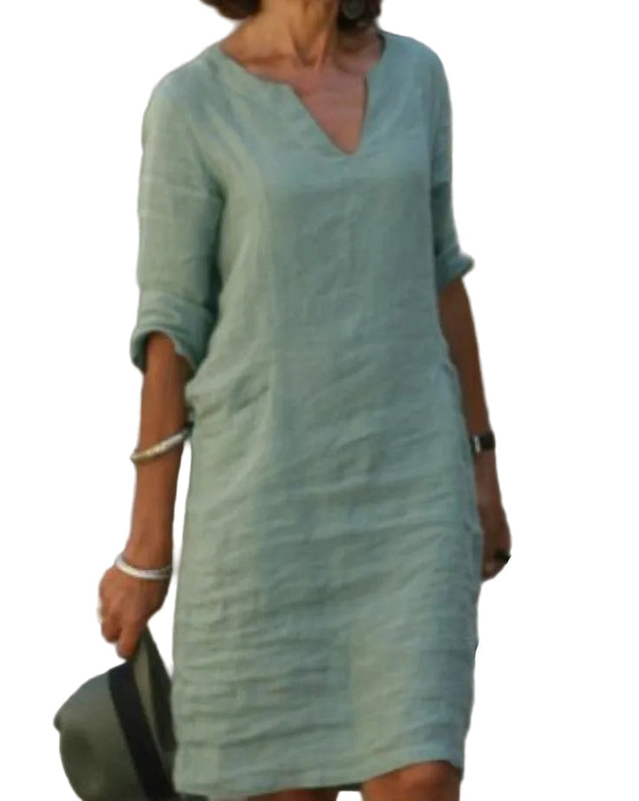 Women's casual V-neck midi dress with 3/4 sleeves, ideal for summer style & comfortable everyday wear.