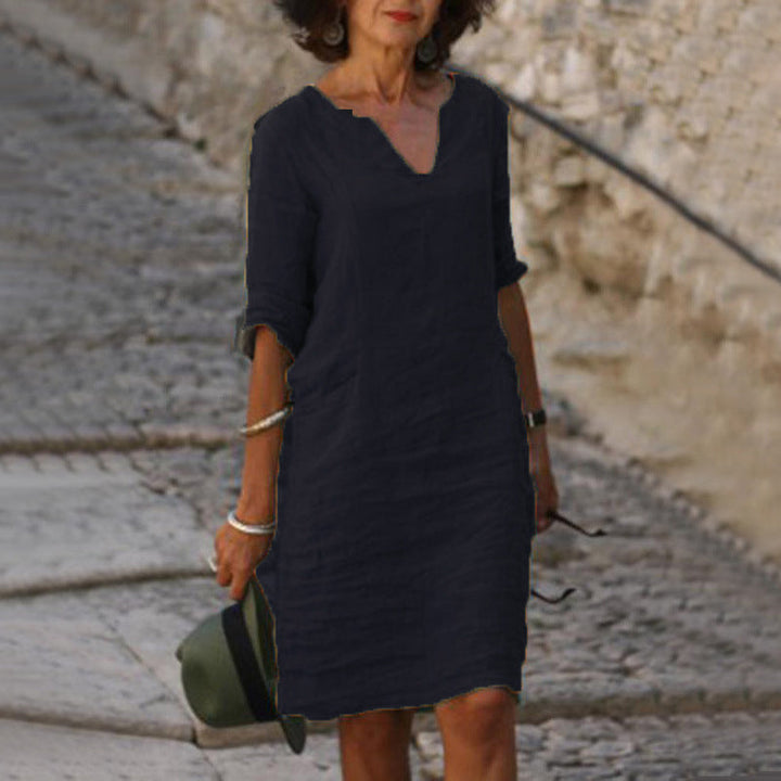 Versatile women's V-neck midi dress with 3/4 sleeves; perfect casual, everyday, or vacation outfit.