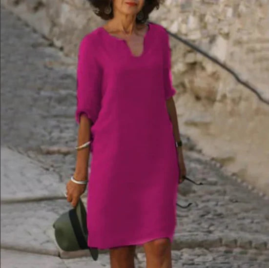 Everyday women's V-neck shift dress with half sleeves and pockets, perfect for summer comfort.