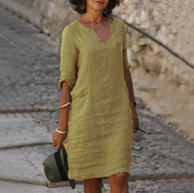 Elegant casual V-neck shift dress for women, half sleeves, comfortable and versatile for summer.