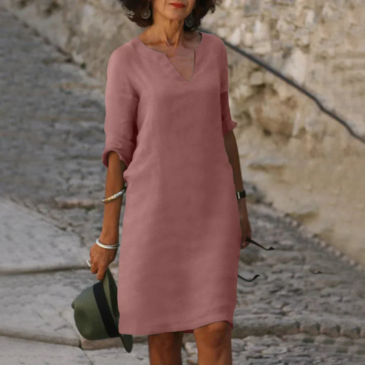 Lightweight summer V-neck shift dress for women, half sleeves, comfortable everyday wear.