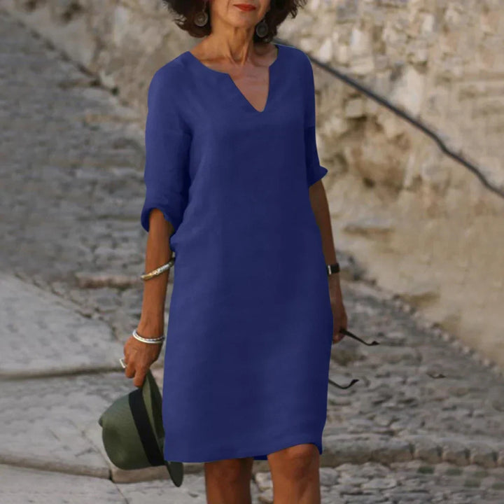 Casual V-neck women's summer shift dress, half sleeves, comfortable for daily wear.