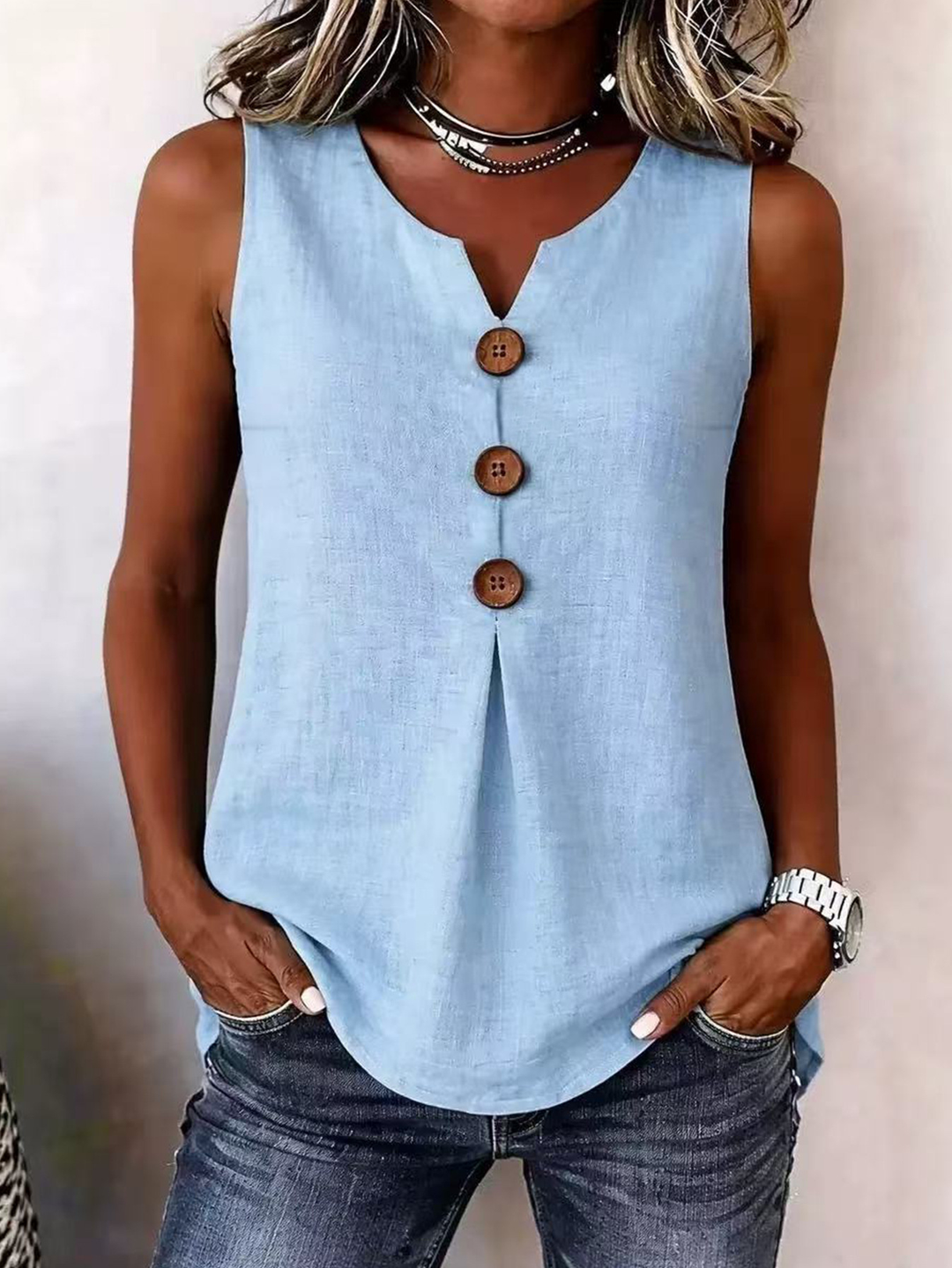 Women's casual V-neck sleeveless blouse with pleated front. Perfect for everyday summer wear.