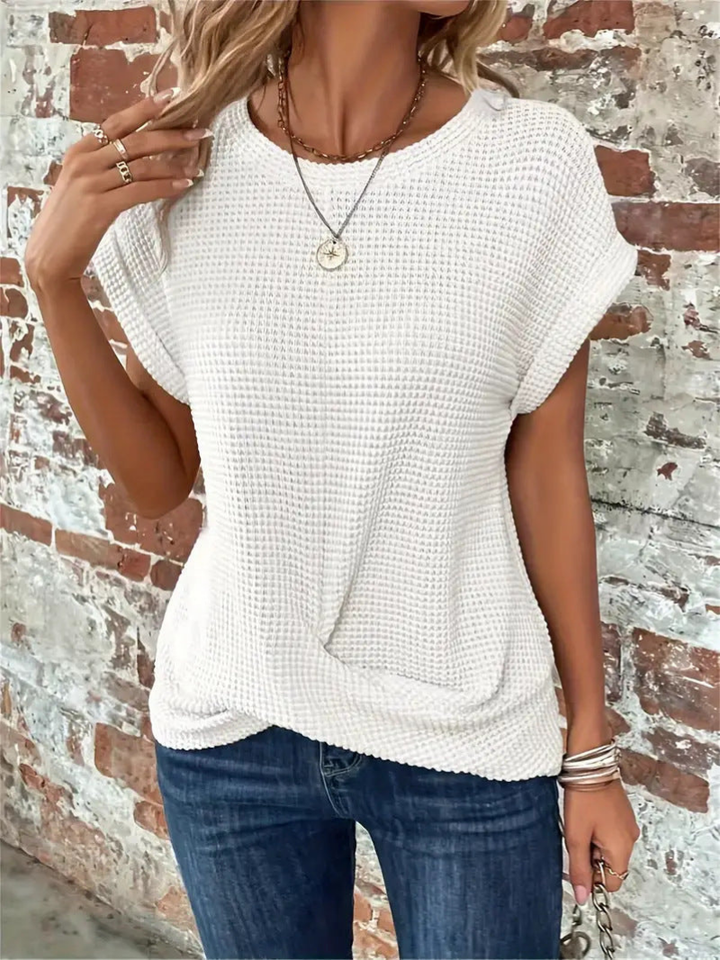 Textured waffle knit short sleeve top for women, a comfortable and stylish choice for everyday wear.