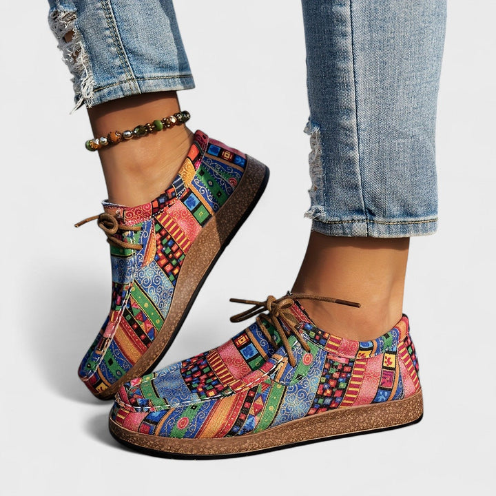 Side view: Women's comfortable casual walking sneakers with wide heel support & breathable mesh upper.