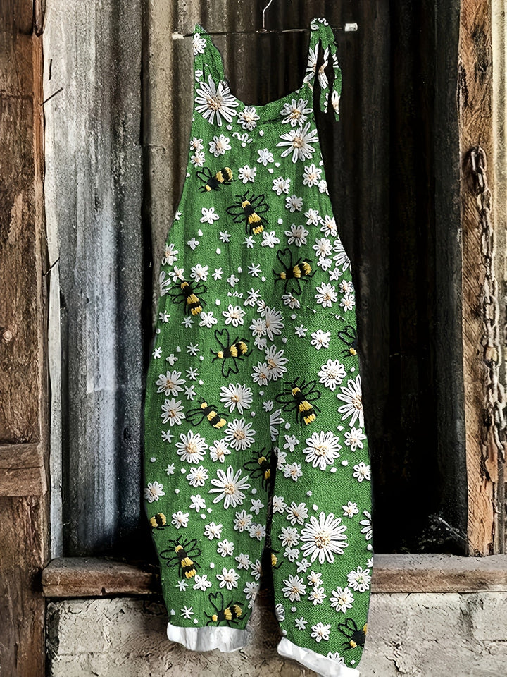 Cropped women's casual wide-leg jumpsuit, vibrant daisy bee print, with convenient side pockets. Summer outfit.