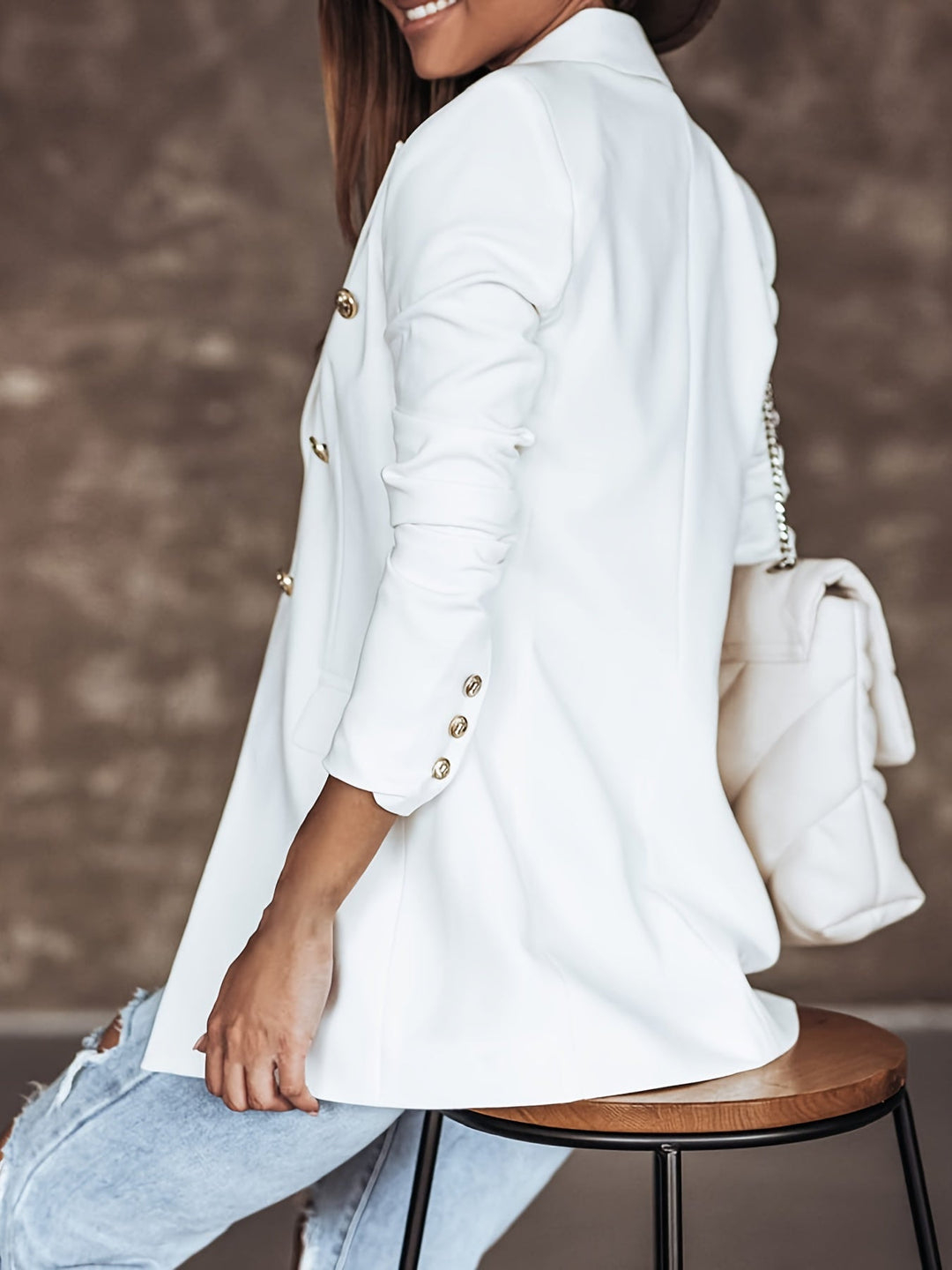 Elegant women's button blazer, double-breasted workwear, a staple for professional and casual fashion.