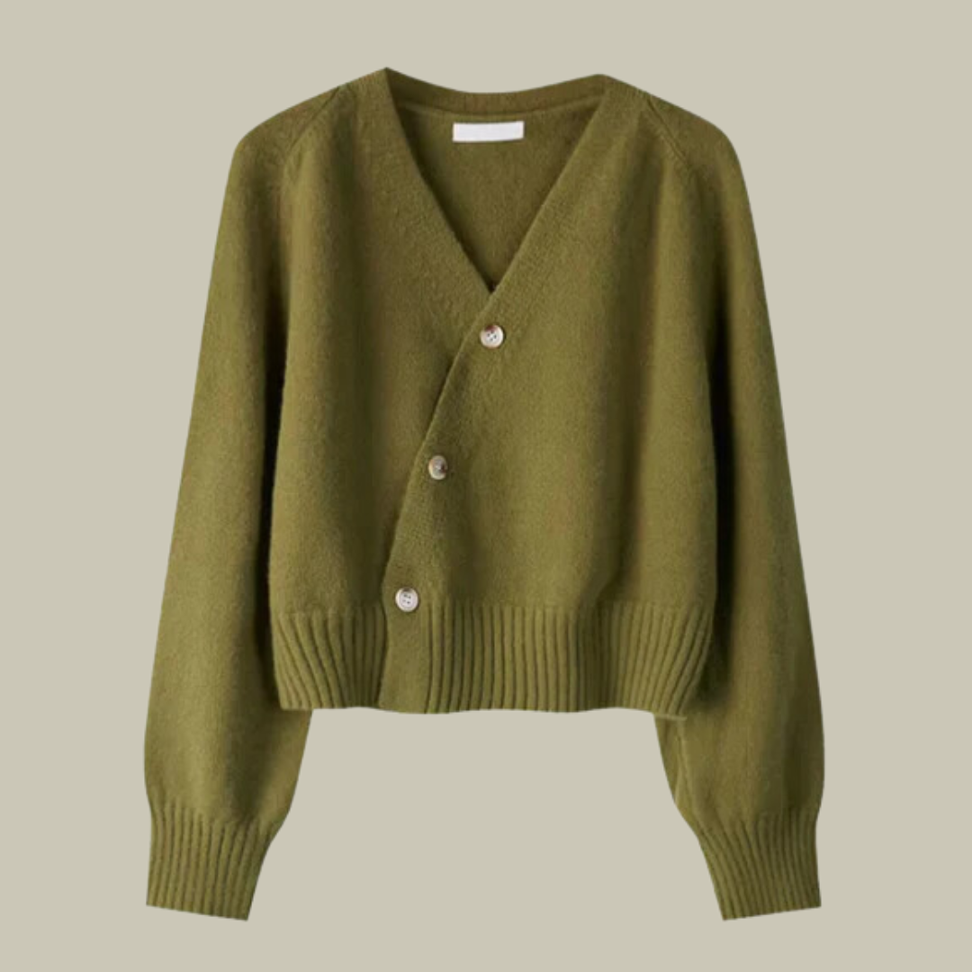 Elegant women's winter fashion: v-neck cross button sweater made from soft merino wool blend.
