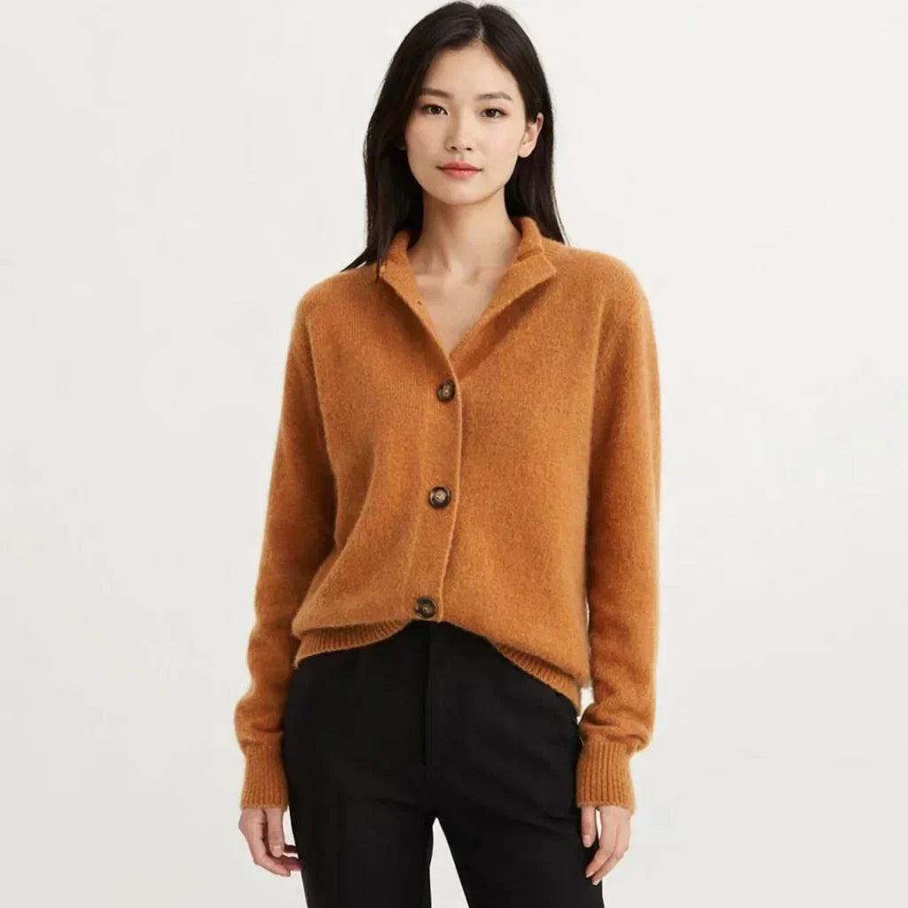 Women's chic asymmetrical button-up knit cardigan. Perfect for effortless fall & winter layering.