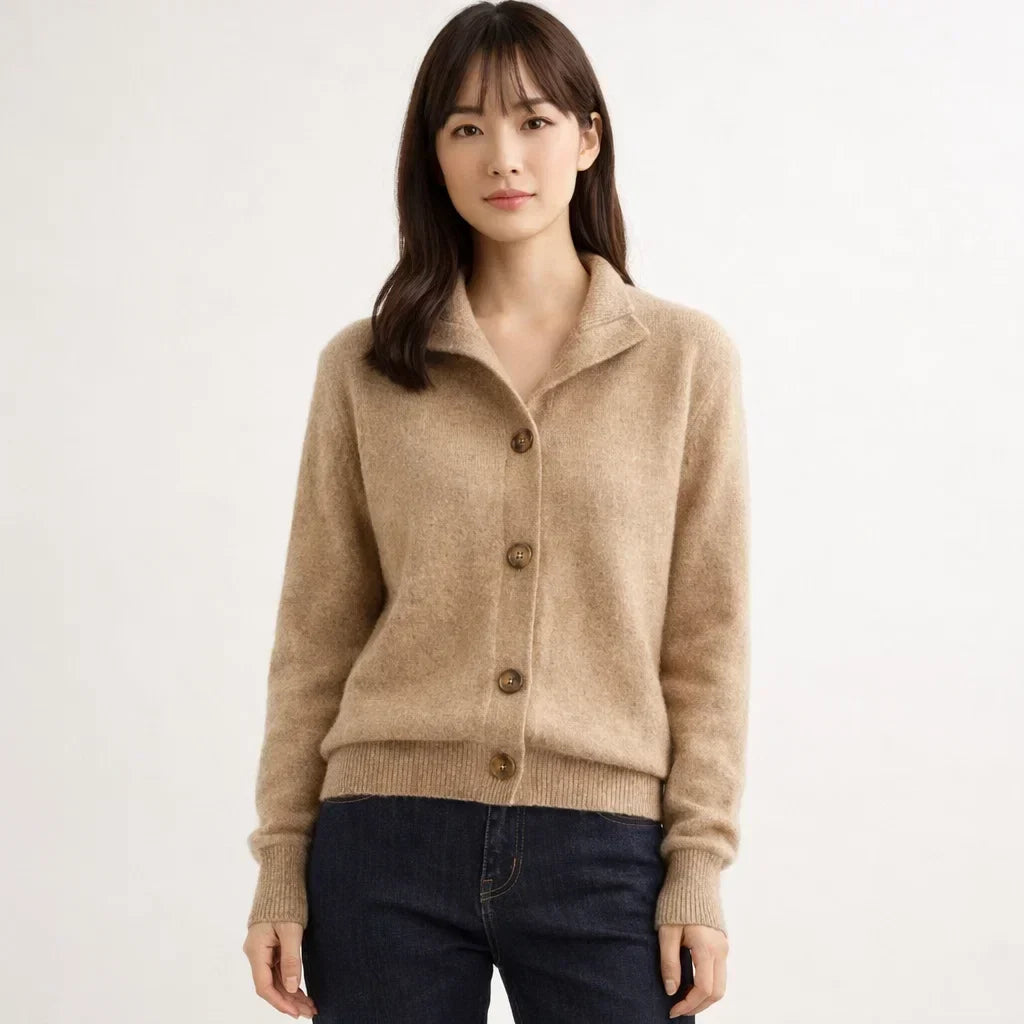 Relaxed fit women's asymmetrical cardigan, soft knitwear for a chic and cozy winter style.