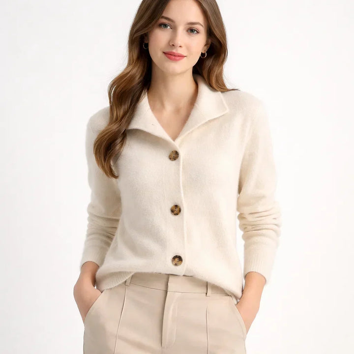 Stylish women's asymmetrical button cardigan in soft knit for a chic fall/winter look.