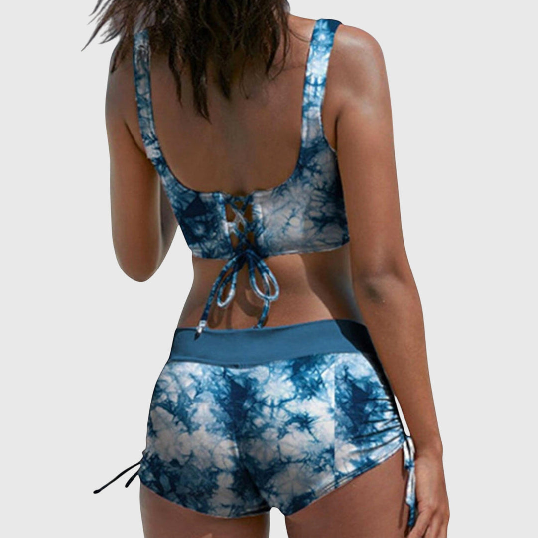 Fashionable women's multi-color bikini set, ideal for summer fashion, beach trips, and luxurious poolside lounging.