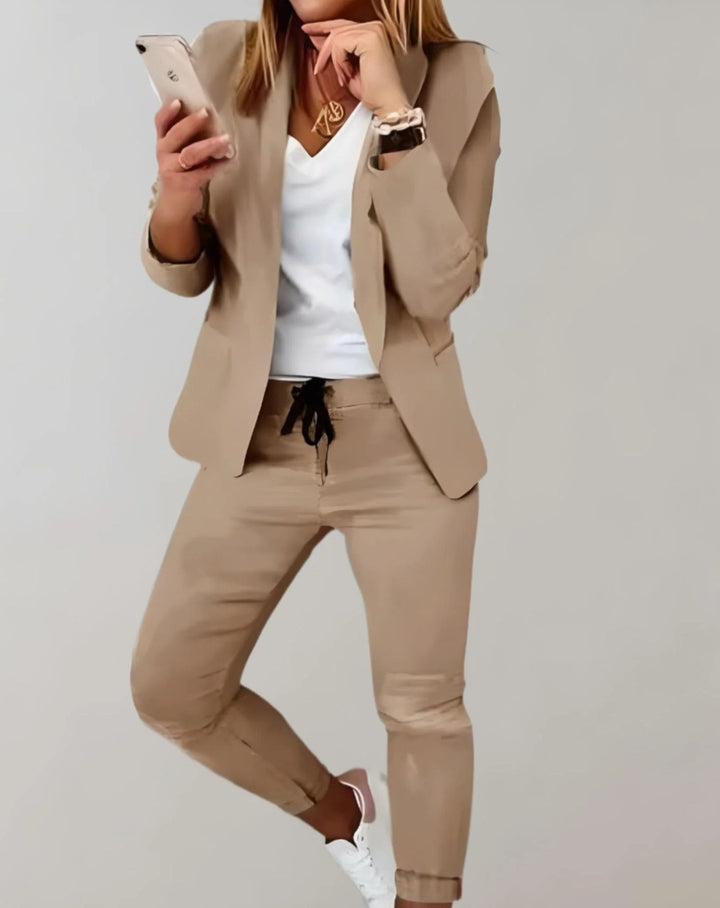 Elegant women's coordinated blazer and trouser set, ideal for spring outfits and chic style.