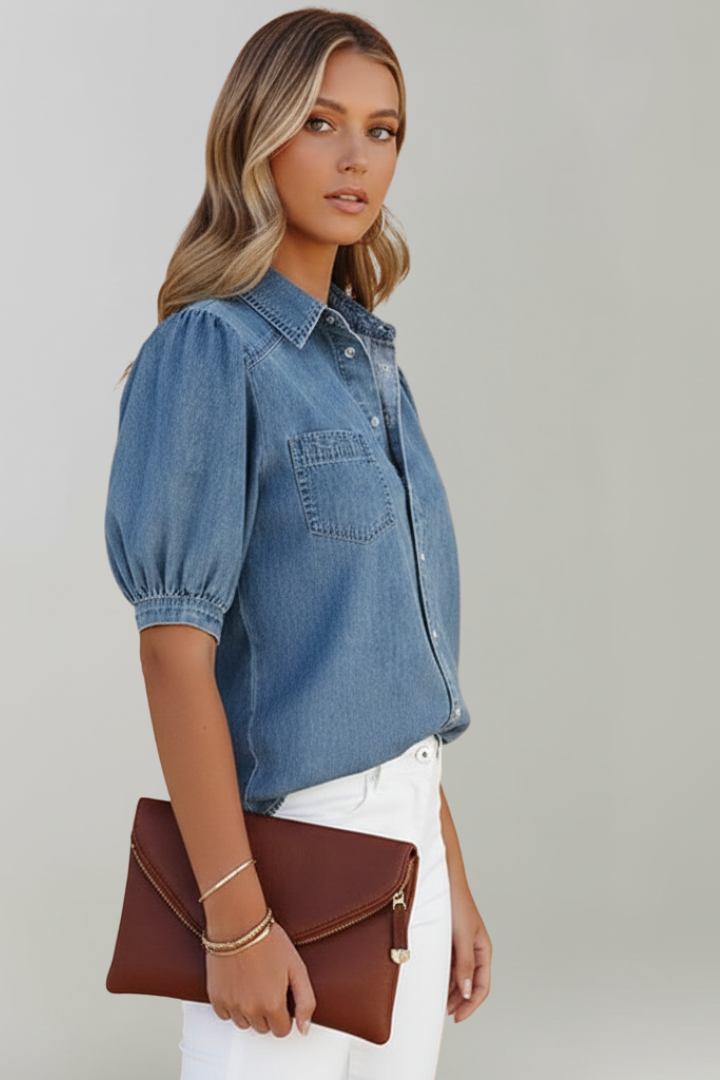 Elegant women's blue button-down shirt featuring trendy puff sleeves and a loose, comfortable fit.