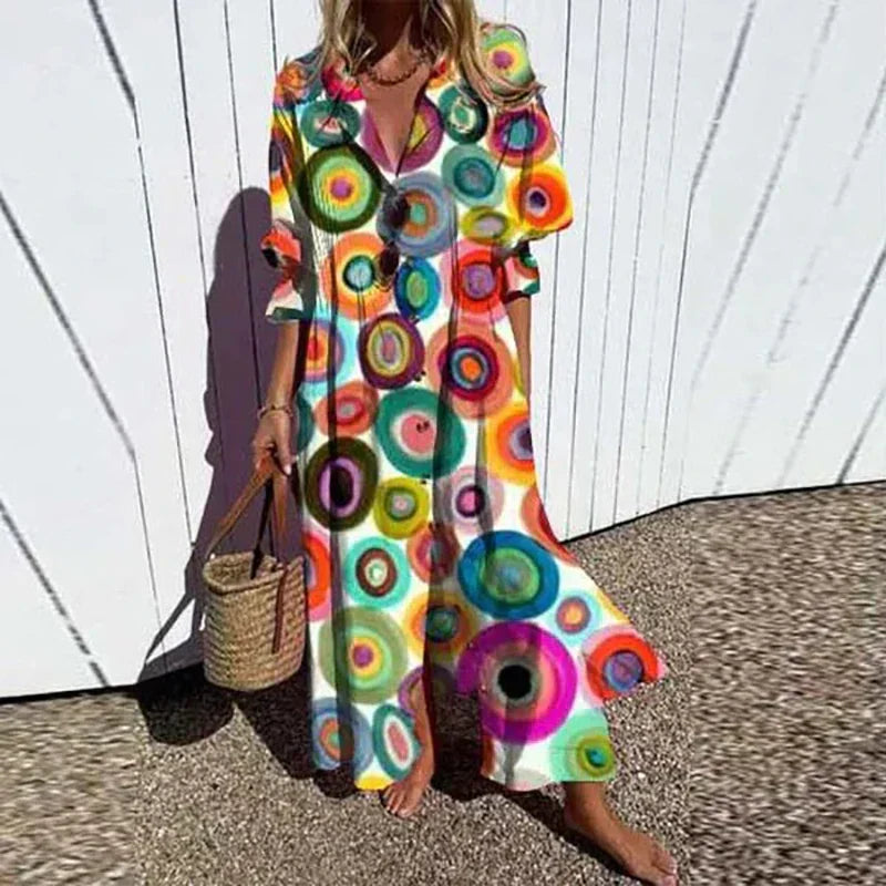 Fashionable women's long button-down maxi dress, collared, offering a comfortable loose fit for spring & summer.
