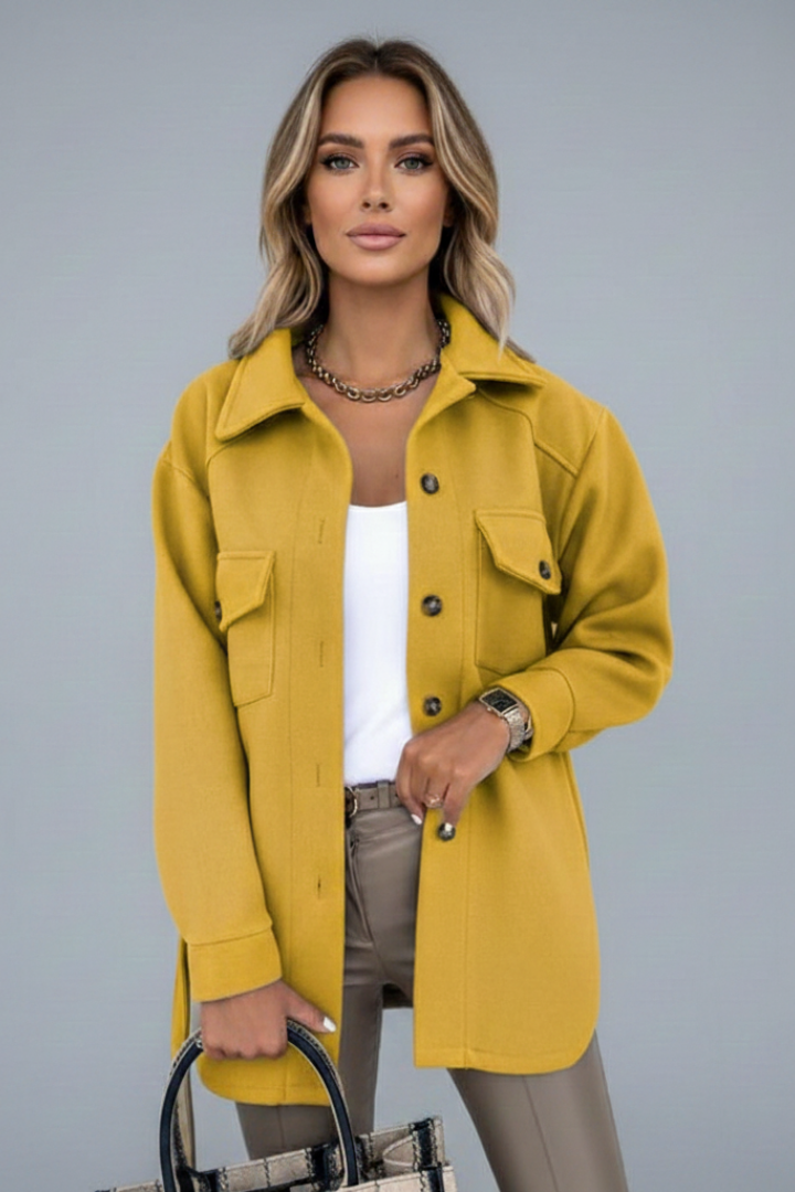 Modern women's straight cut collared shirt jacket. Chic long sleeve, button-up, versatile outerwear.