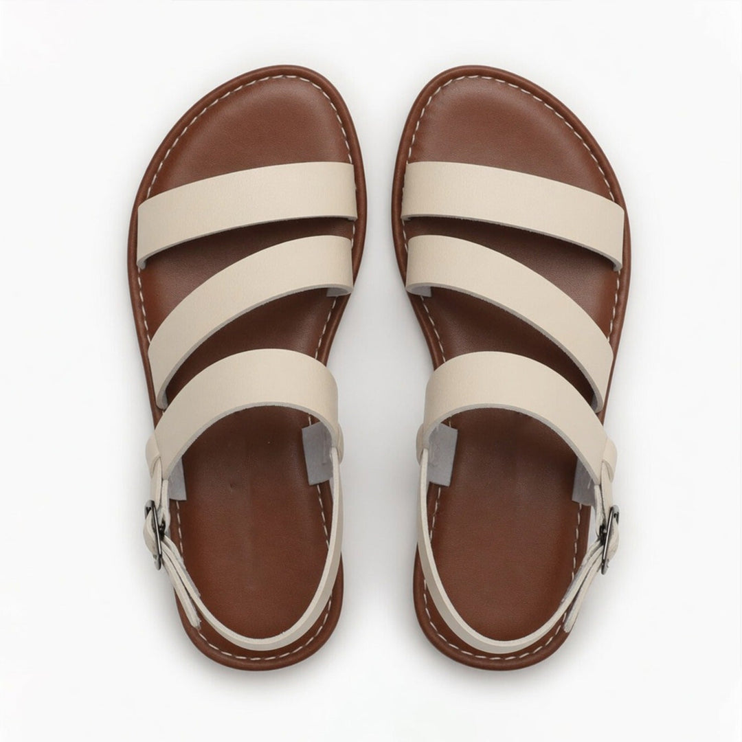 Comfortable women's casual flat sandals, chic crossover straps, great for summer.