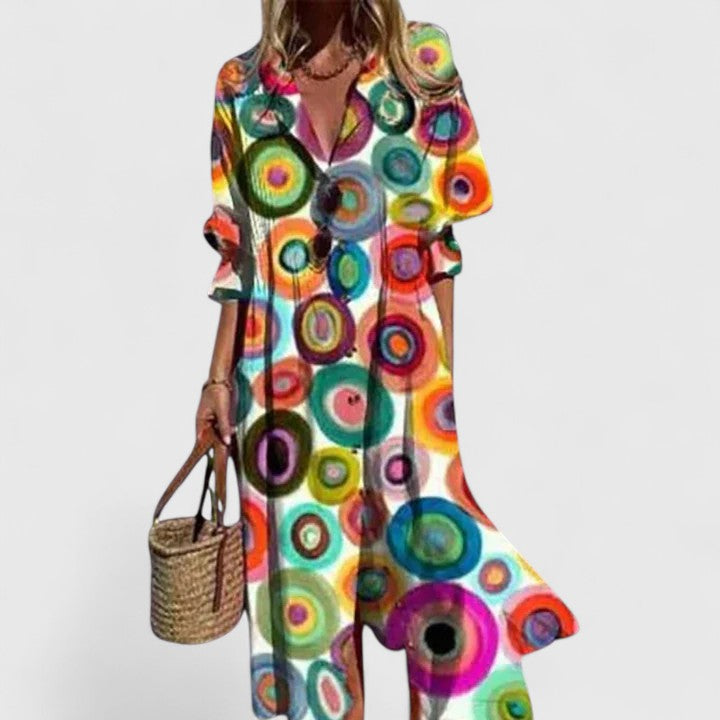 Chic women's button-down floral midi dress, an elegant choice for summer evenings & resort fashion.