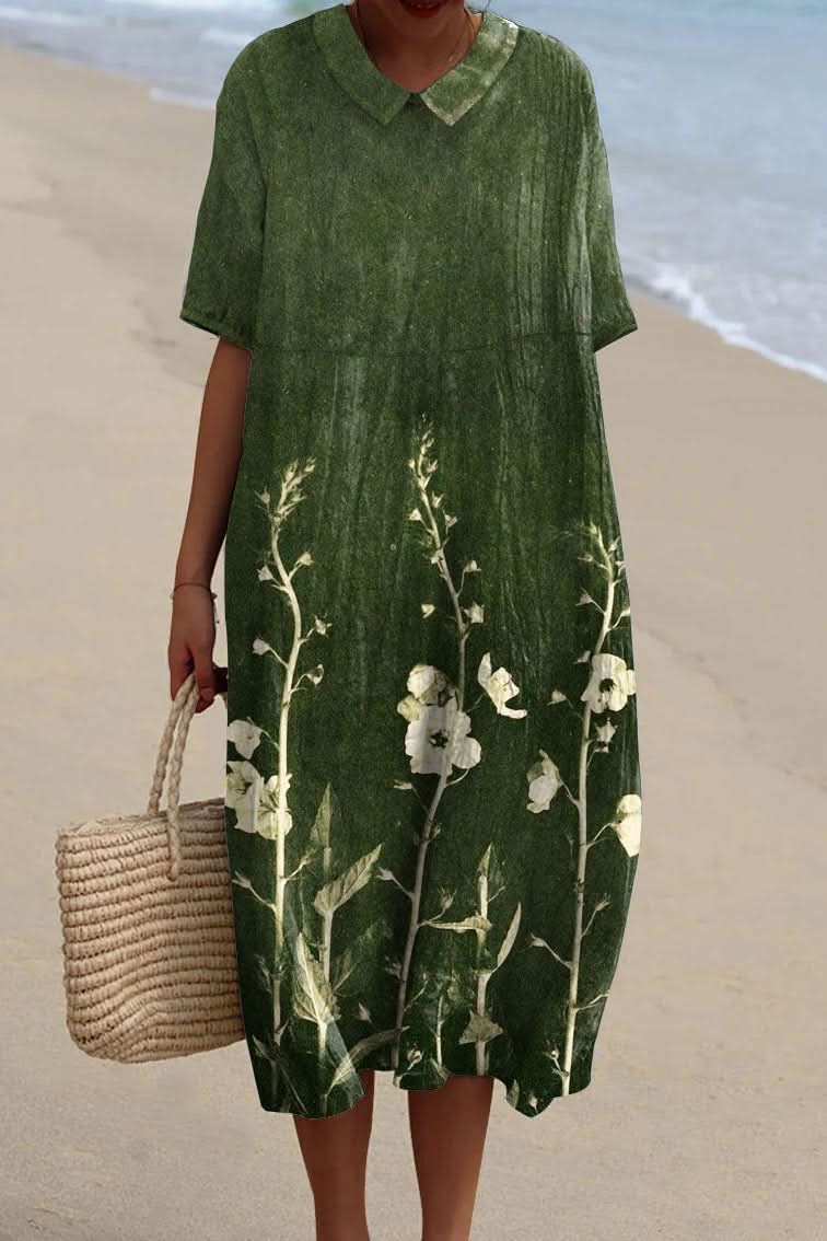 Feminine floral V-neck midi dress for women, offering a relaxed and elegant look for spring and summer events.