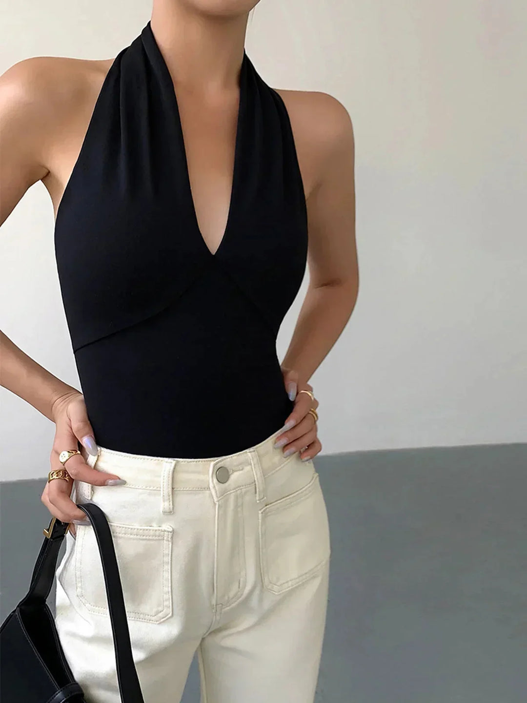 Women's chic halter top, sleeveless V-neck, perfect for casual everyday style.