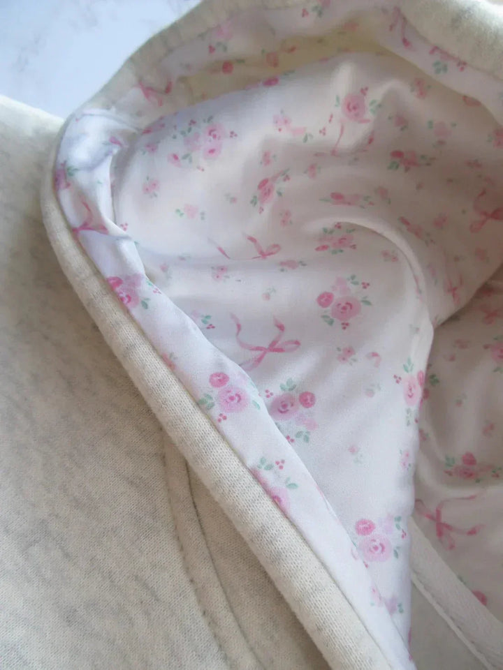 Chic women's comfortable hoodie with elegant bow detail, perfect for casual wear, and a soft fabric.