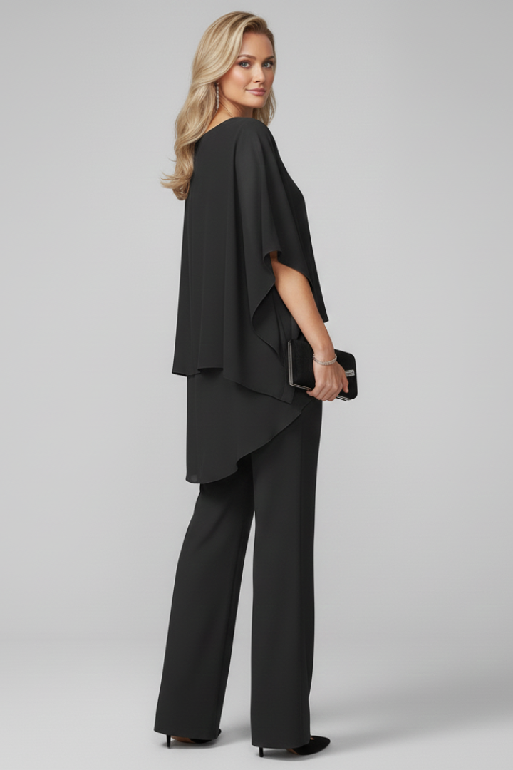 Full-length view of a women's elegant off-shoulder top & straight-leg pants set. Perfect for spring & summer style.