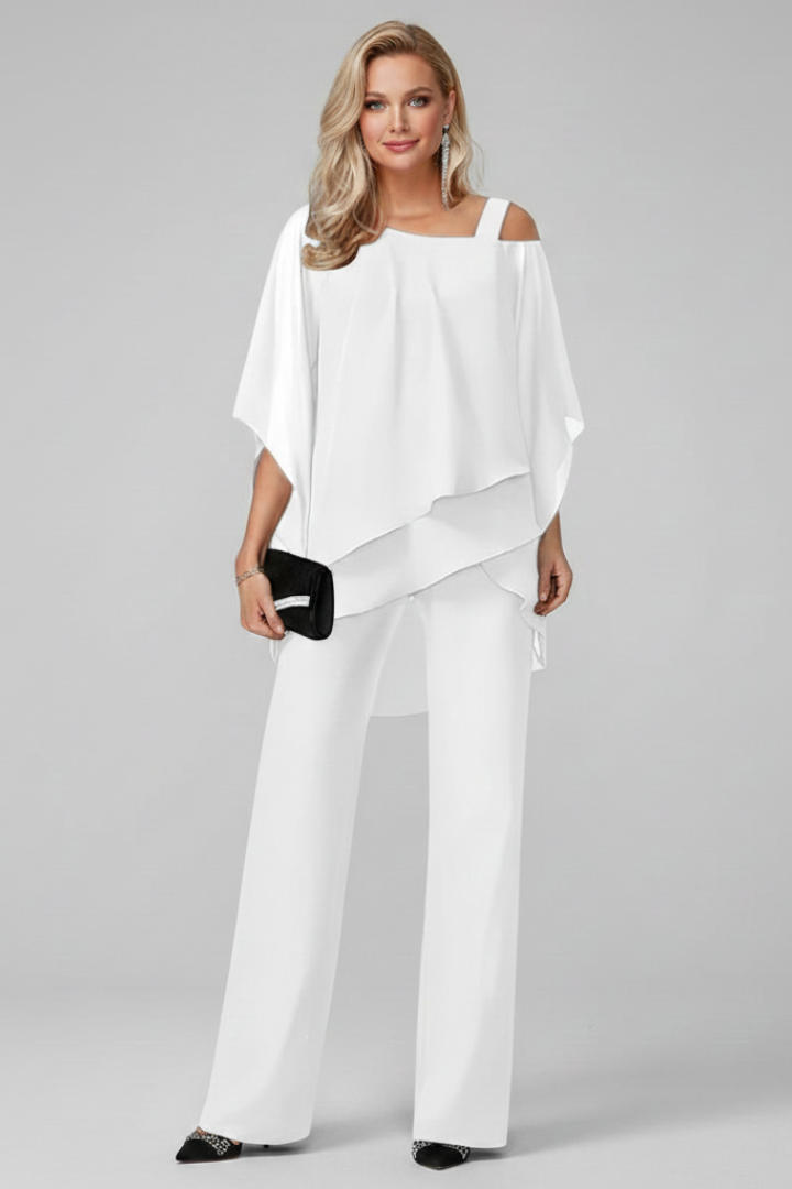 Model wearing a comfy women's off-shoulder top and straight-leg pants set. Ideal for a stylish spring outfit.