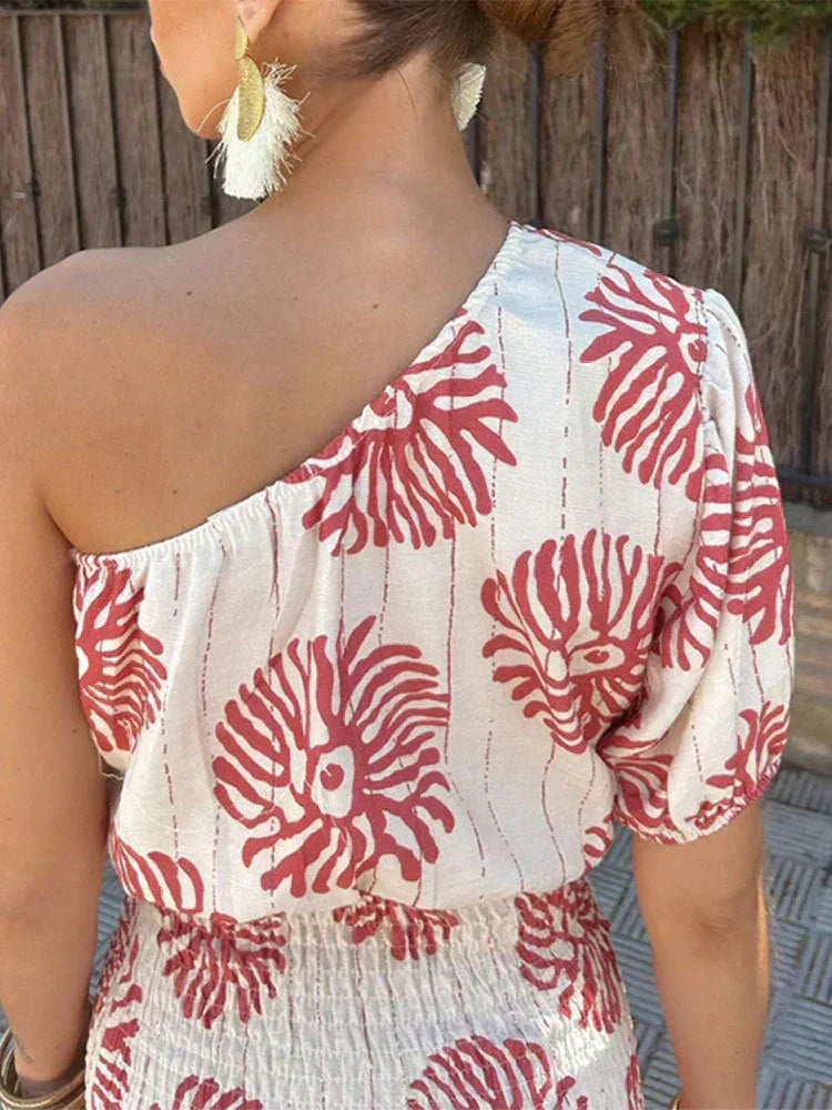 Elegant one-shoulder printed mini dress for women, a chic choice for summer vacations, parties, or wedding guests.