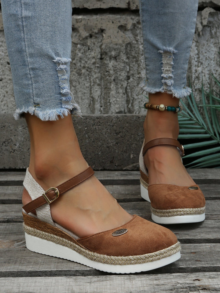 Women's chic platform espadrille sandals for elevated summer style. Comfortable heeled espadrilles.