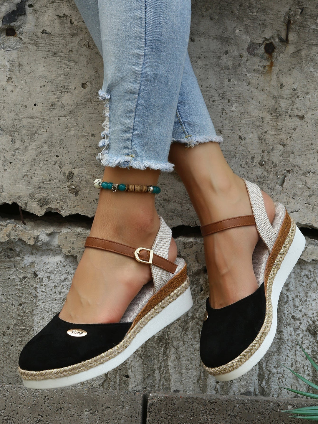 Women's fashionable platform espadrille sandals. Chic closed toe summer shoes for casual elegance & comfort.