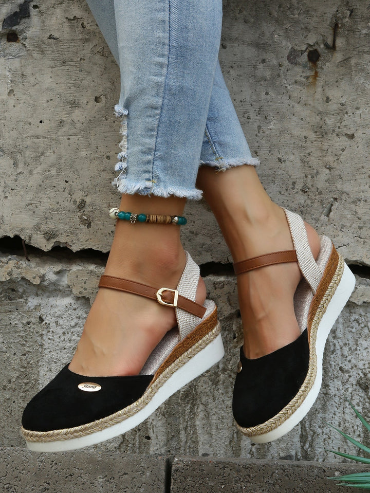 Women's fashionable platform espadrille sandals. Chic closed toe summer shoes for casual elegance & comfort.