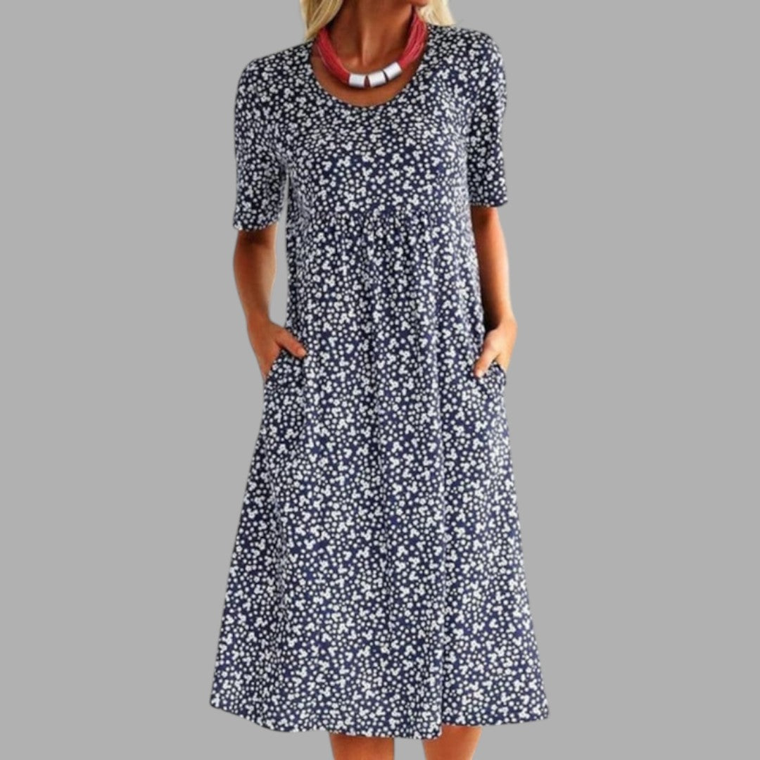 Women's chic printed midi dress, elegant style, perfect for summer fashion & occasion wear.