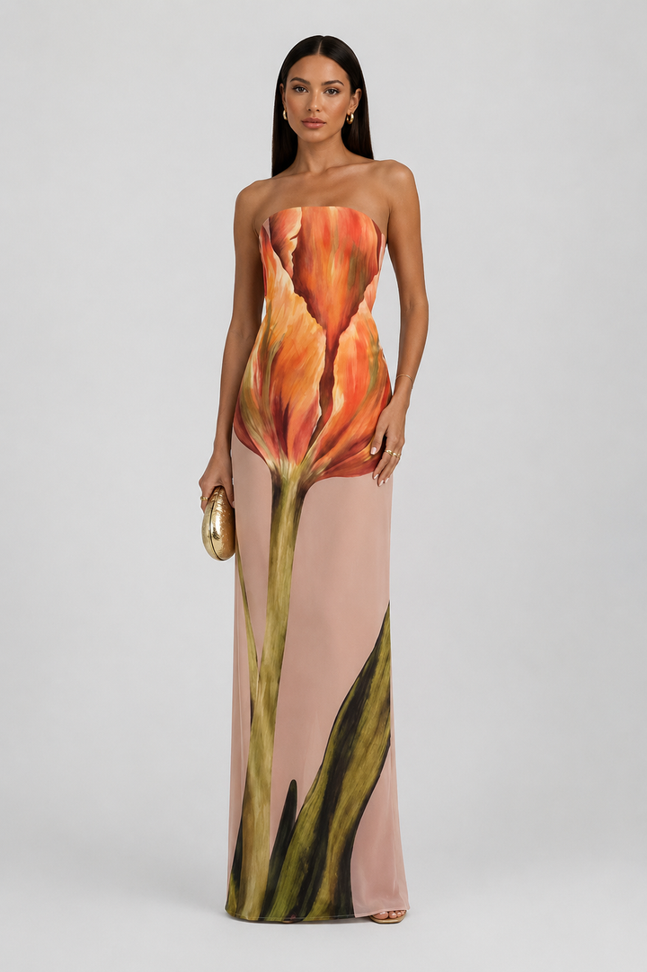 Chic women's strapless maxi dress with a vibrant abstract pattern, great for casual summer elegance.
