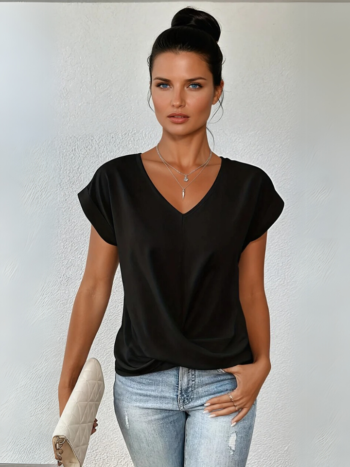 Women's chic twist-front V-neck short sleeve top. Elegant, versatile for day to night wear.