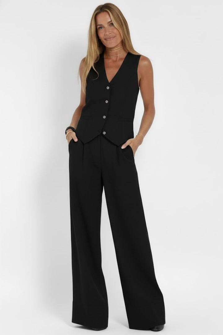 Women's business casual outfit: a stylish V-neck waistcoat & comfortable wide-leg pants set. Effortlessly chic.