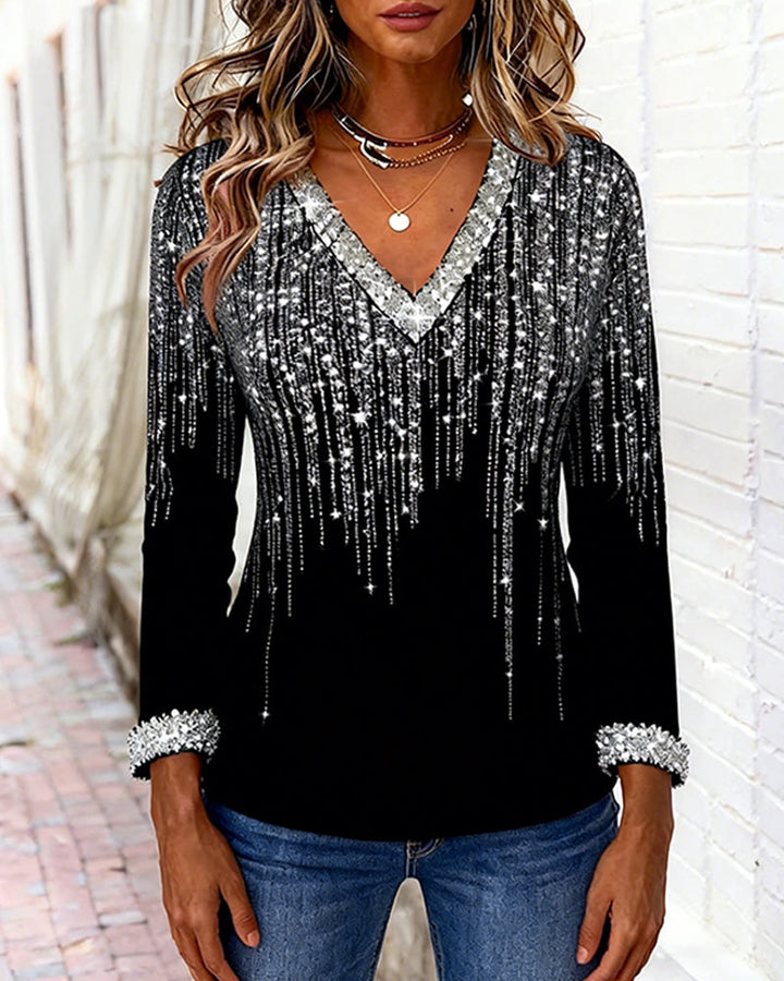 Comfortable women's printed long sleeve V-neck top, a versatile addition to any wardrobe.