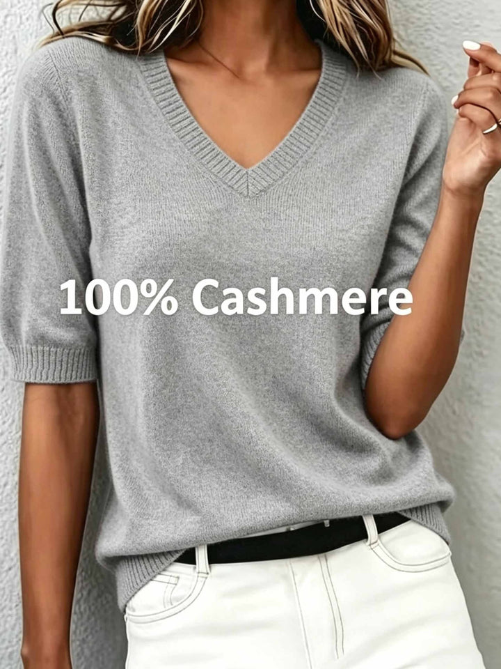 Classic V-neck short-sleeve women's sweater, a chic and versatile top for various smart casual occasions.