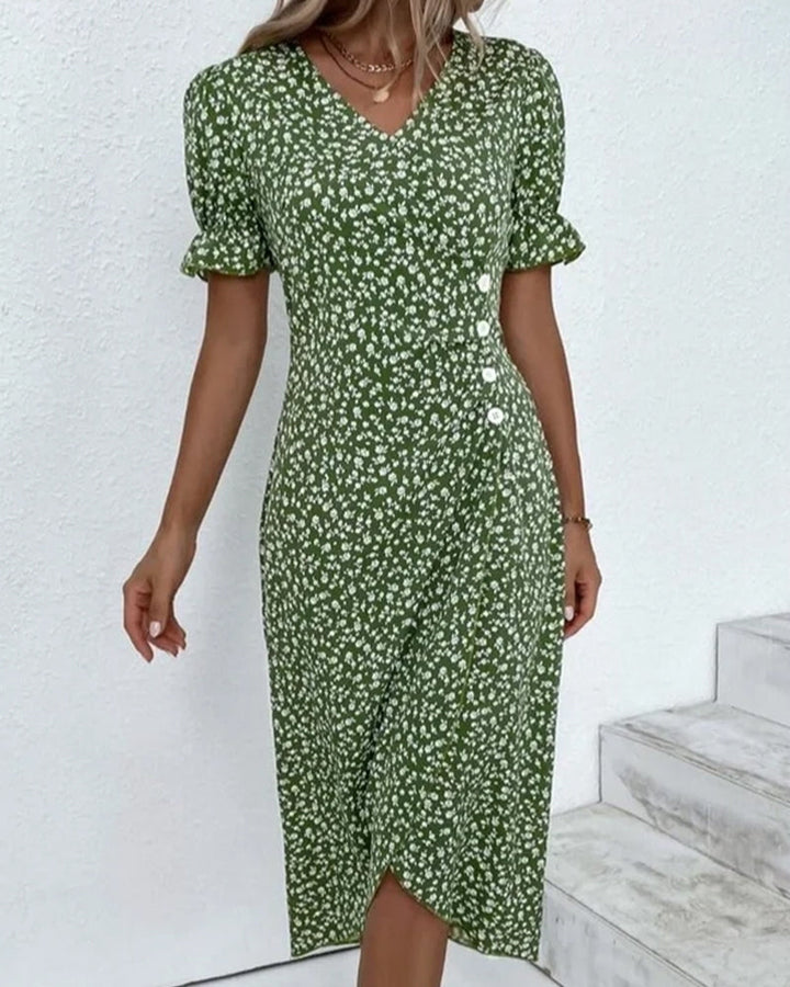 Boutique women's V-neck wrap midi dress, short sleeve, printed, chic summer fashion.