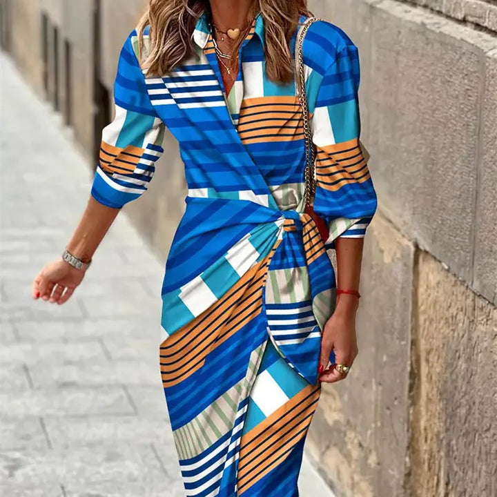 Women's elegant V-neck wrap shirt dress, ideal for office or casual chic. Long sleeve midi for effortless style.