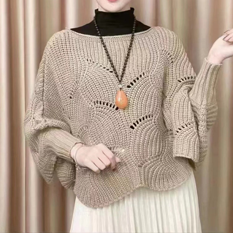 Warm women's batwing sweater with a cozy shawl neck, perfect for winter outfits