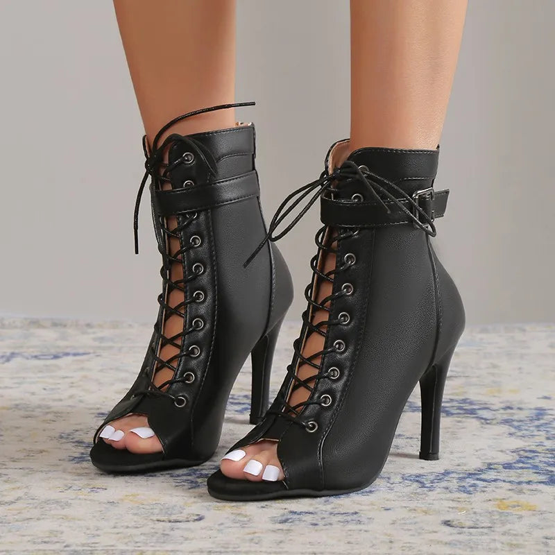 Women's classic black lace-up stiletto heels with open toe and ankle strap, elegant party shoes.