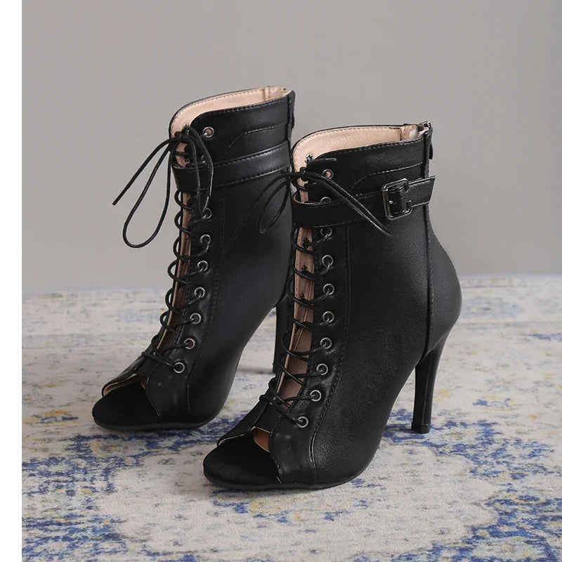 Open-toe black lace-up stiletto heels, offering both elegance and modern style for women.