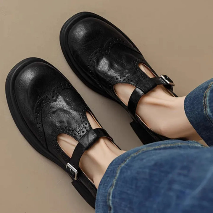 Elegant women's leather T-strap shoes, comfortable and stylish for daily fashion.